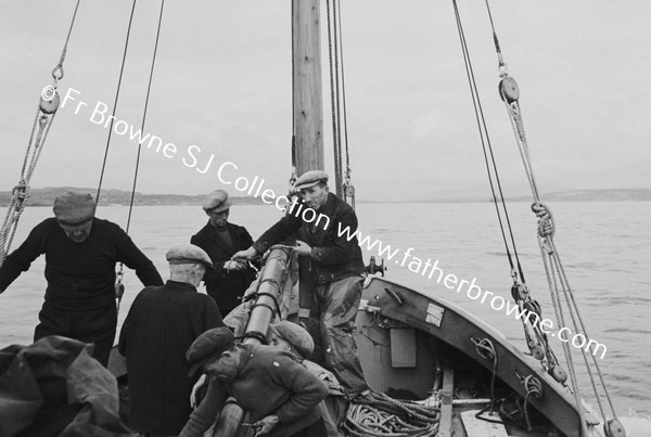 BOATS AND BOATMEN WITH LIFEBOAT TO INNISHMAAN CASHLA BAY  FR KILLEAN PP AND FR KEANE S.J.